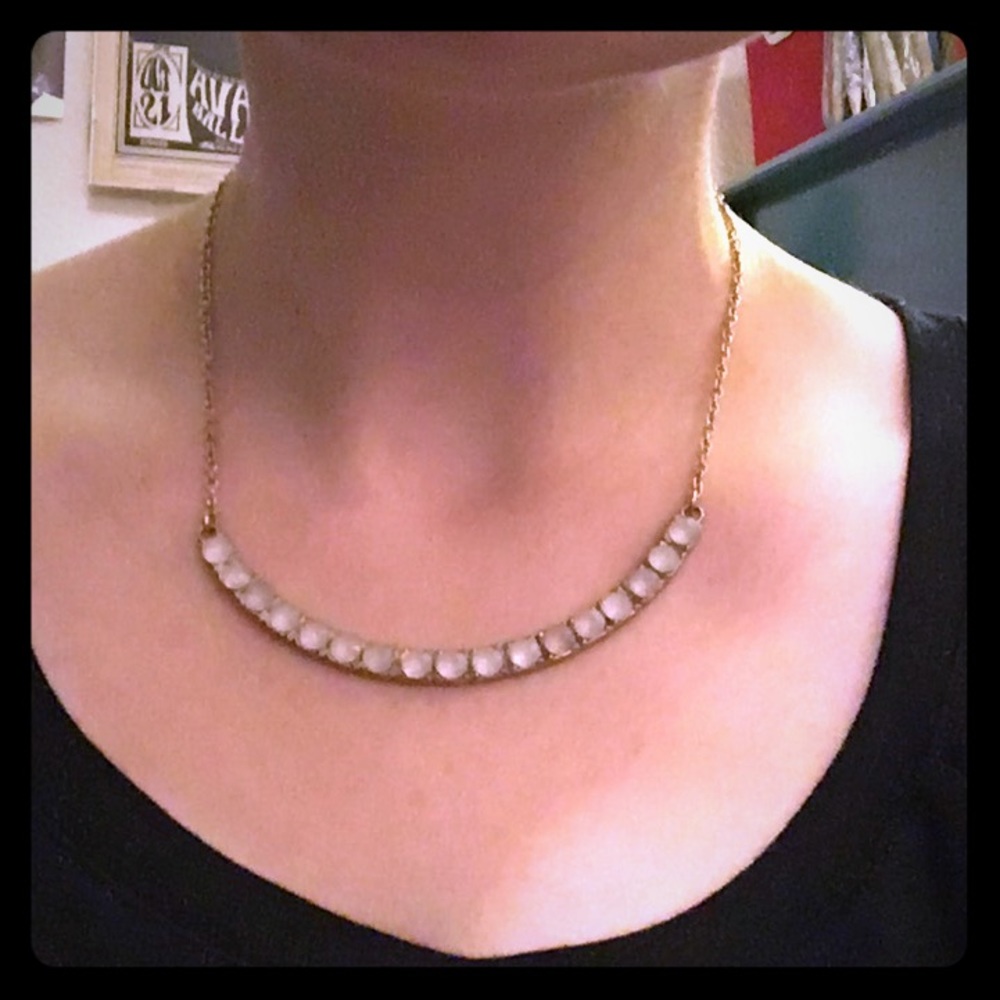 Pale pink gem necklace.